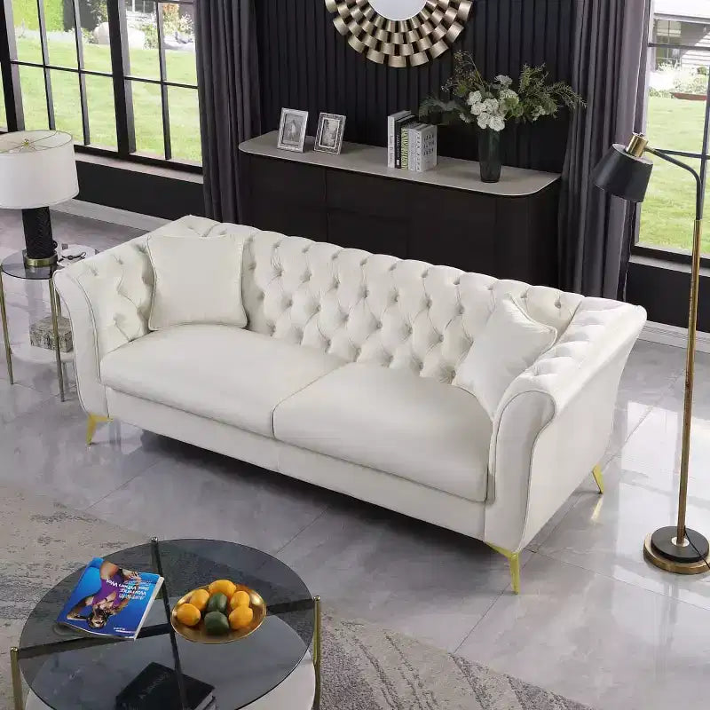 Canapé Chesterfield 3 places en velours ivoire / bleu marine / vert olive avec accoudoirs arrondis et pieds chromés
